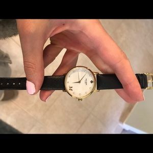 Black and gold Kate spade M watch